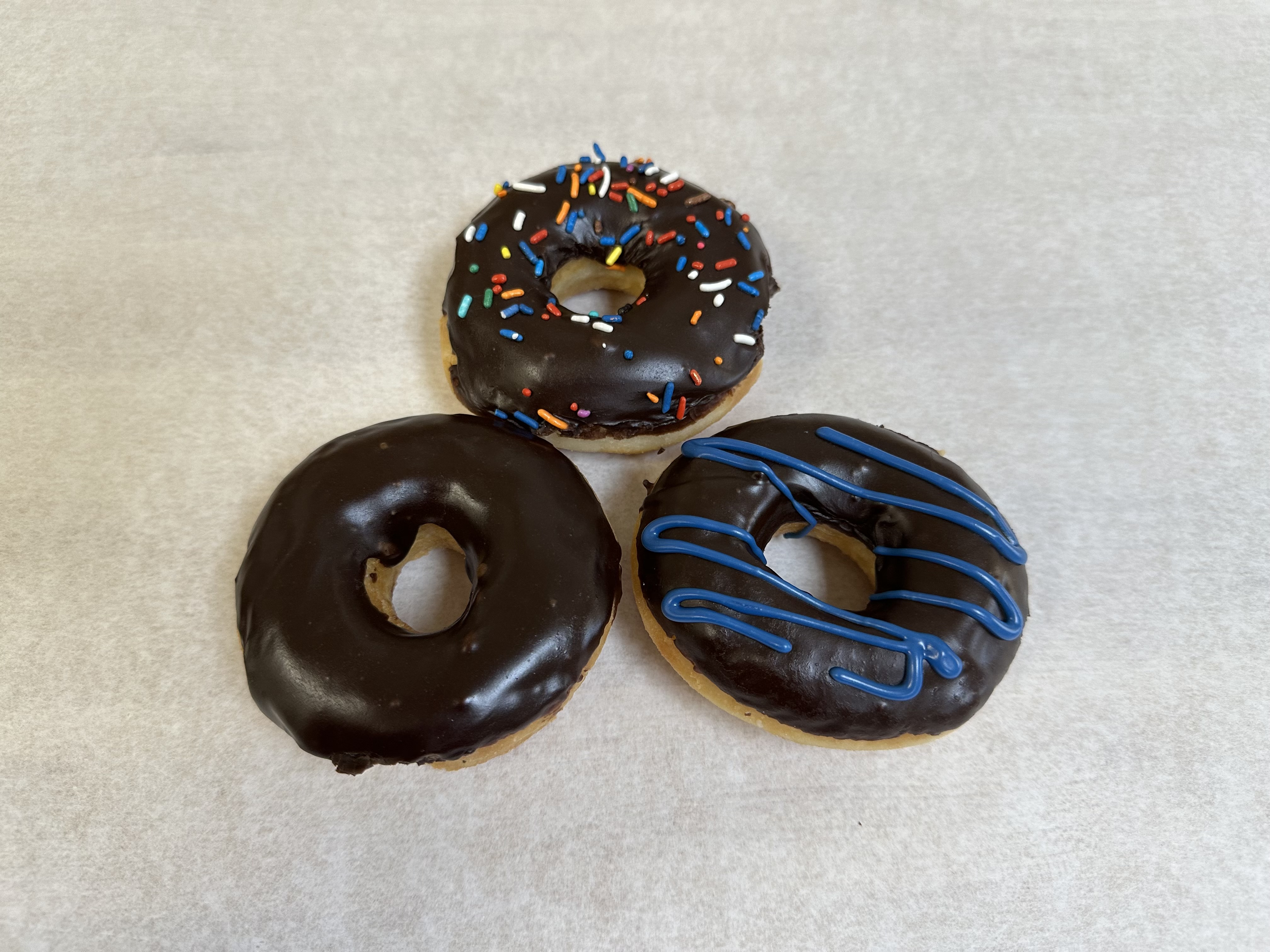 Rich chocolate frosted donuts